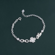 Lắc tay hình cỏ 4 lá dây vô cực khắc tên theo yêu cầu LTN0330